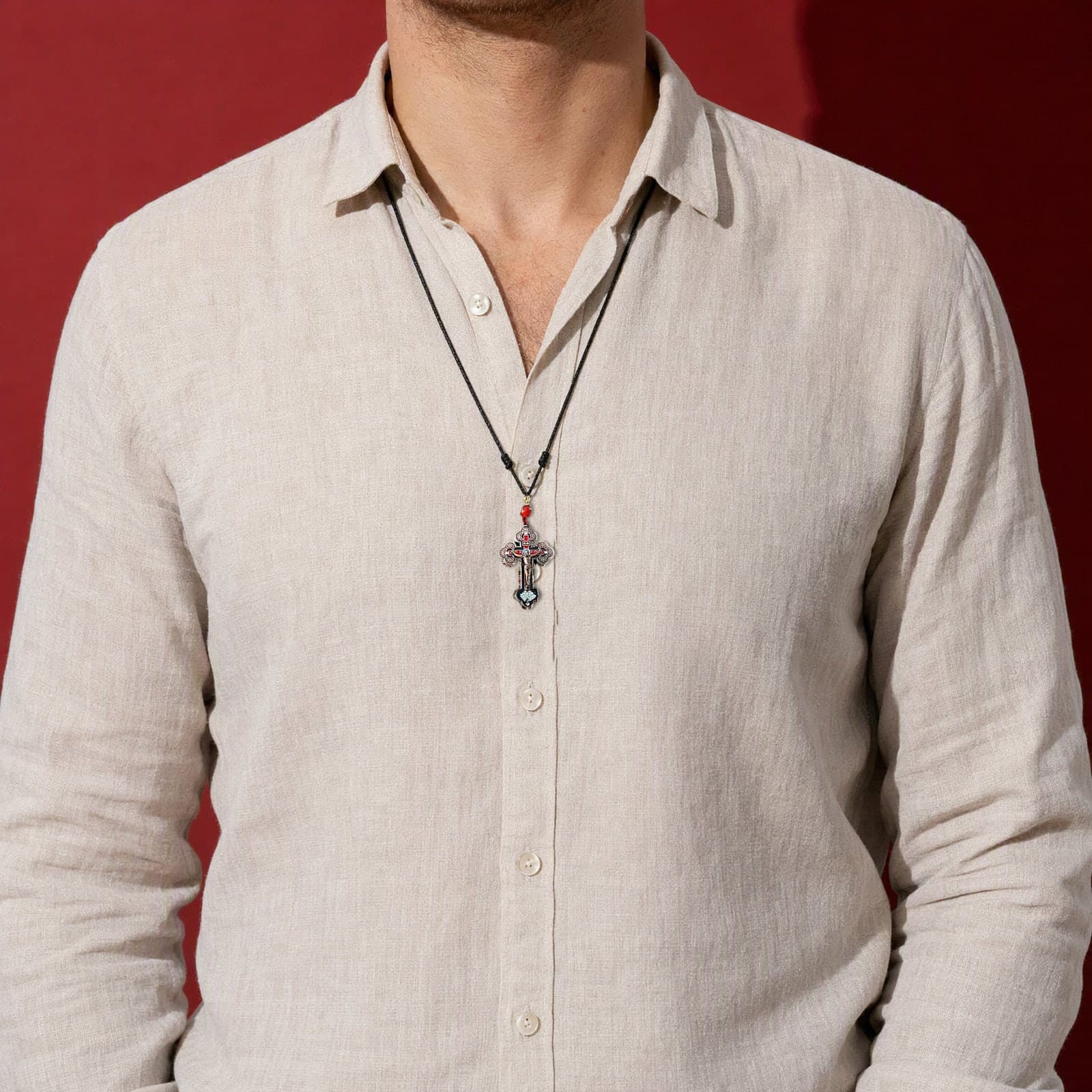 Orthodox Crucifix - Copper Red Color - Stainless Steel Cross worn on a man's chest at its true size (5.5 cm).