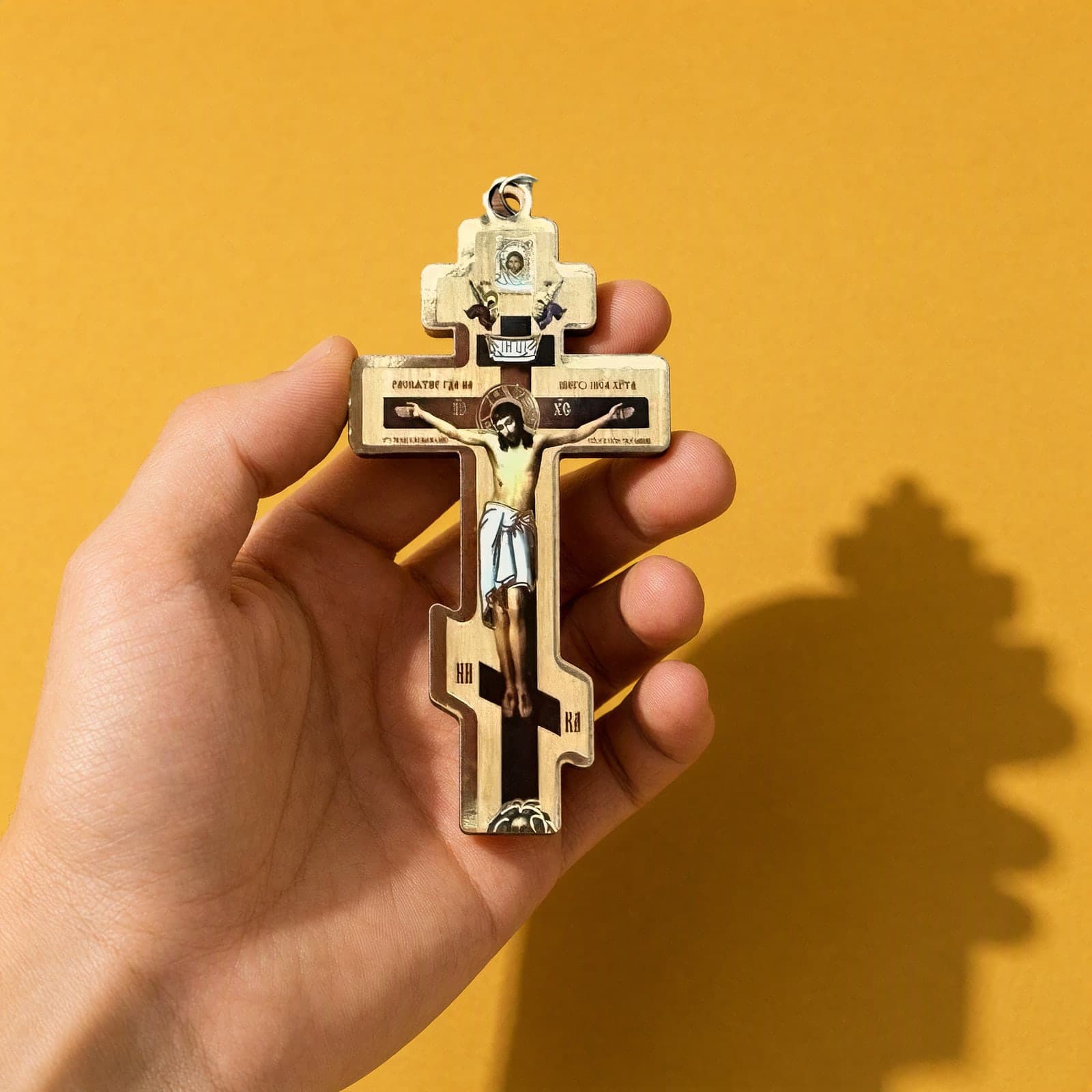 Orthodox Crucifix (Eight-Pointed) - Wooden Cross 10cm held in one hand to show its size (10.0 cm).