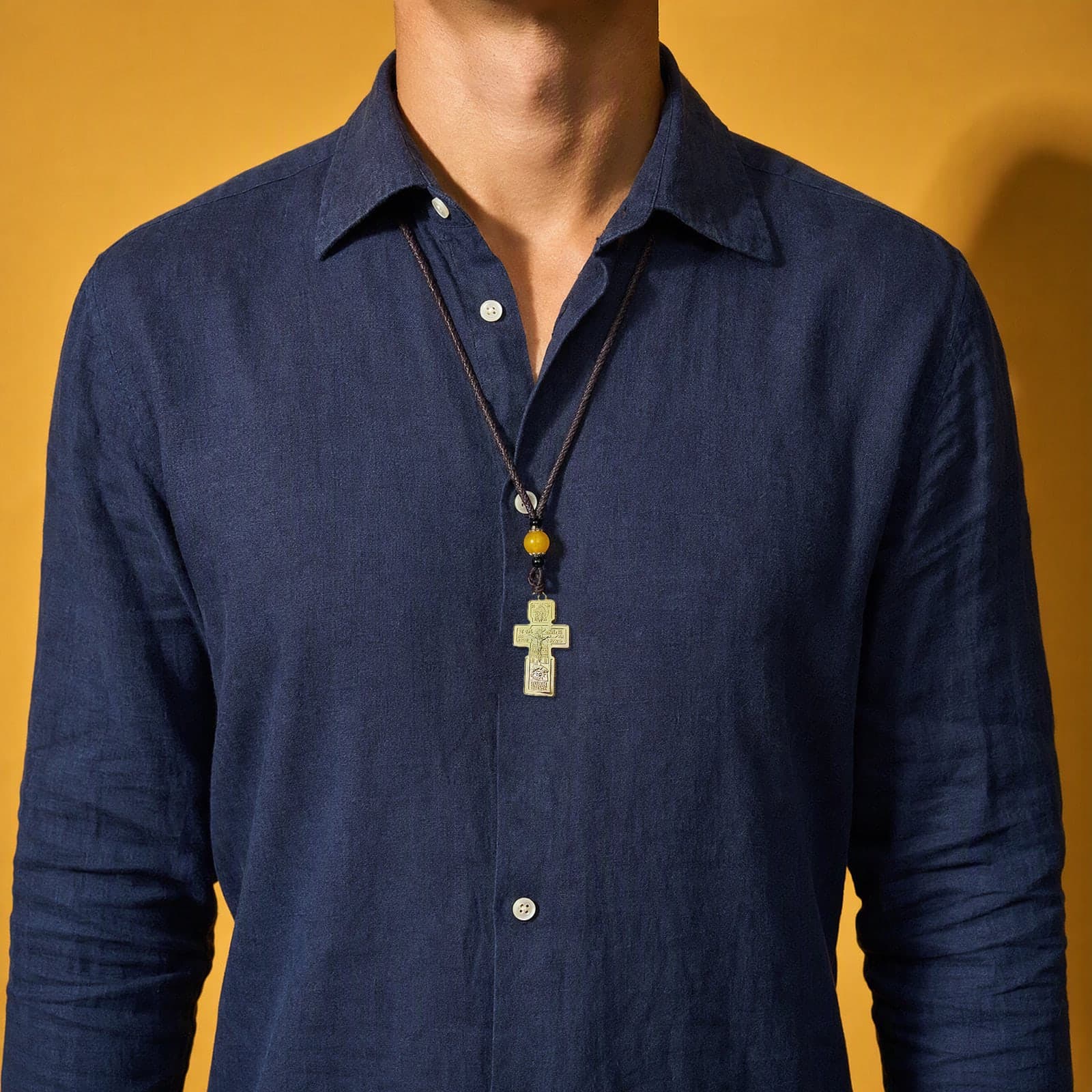Orthodox Crucifix (Holy Face) - Gold Color - Stainless Steel Cross worn on a man's chest at its true size (6.5 cm).