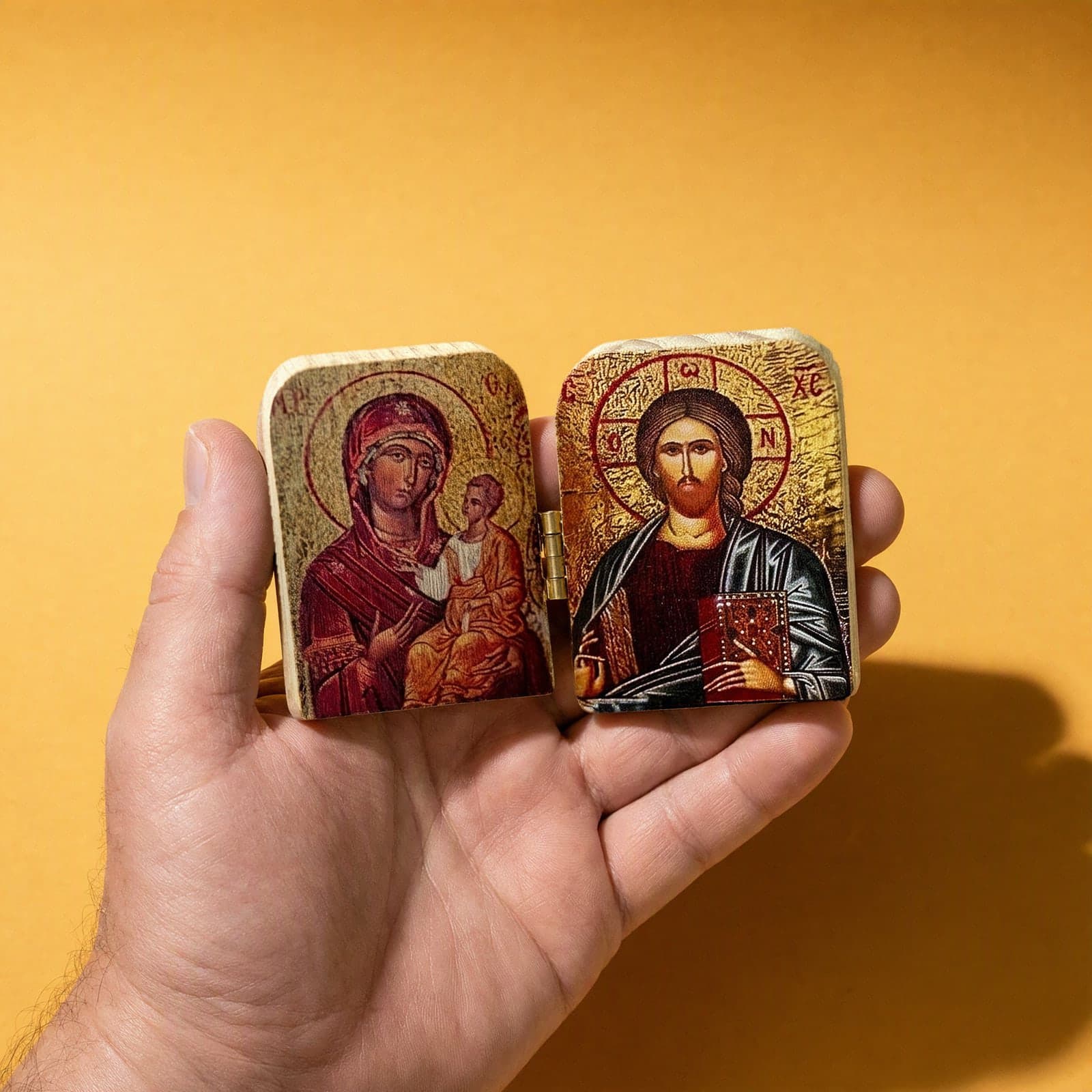 Orthodox Virgin Mary & Child, Jesus Christ - Wooden Icon held in one hand to show its size (about 10 x 8 cm).