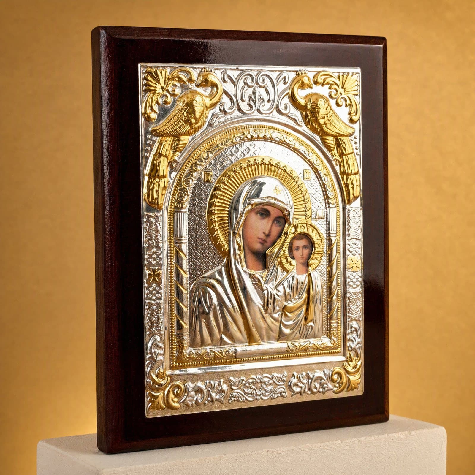 Orthodox Virgin Mary (Our Lady of Kazan, Rectangular), silver and gold wooden icon: close-up of the holy image, the foil and the frame.