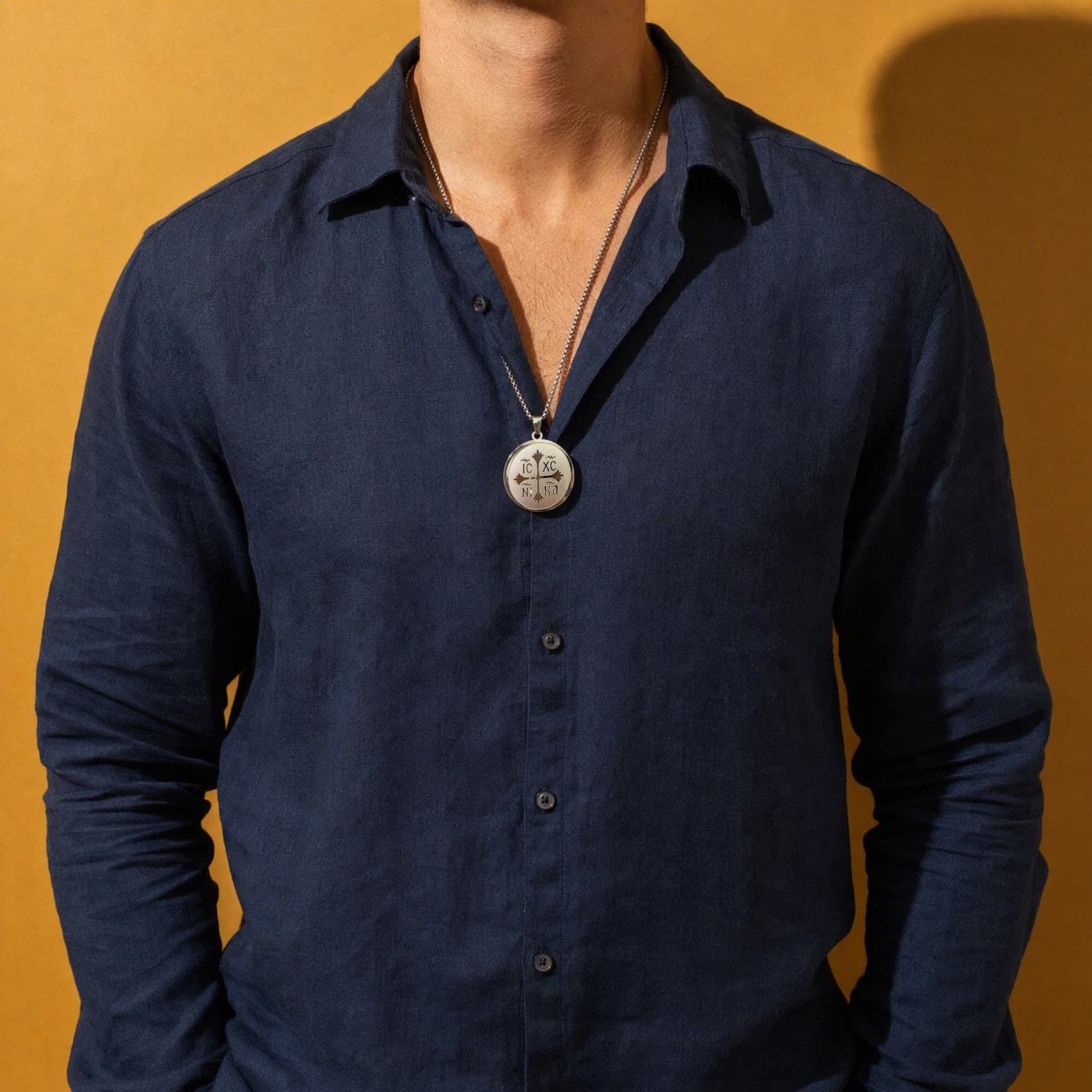 Orthodox IC XC NIKA - Silver Color - Stainless Steel Medallion worn on a man's chest at its true size (4.5 cm).