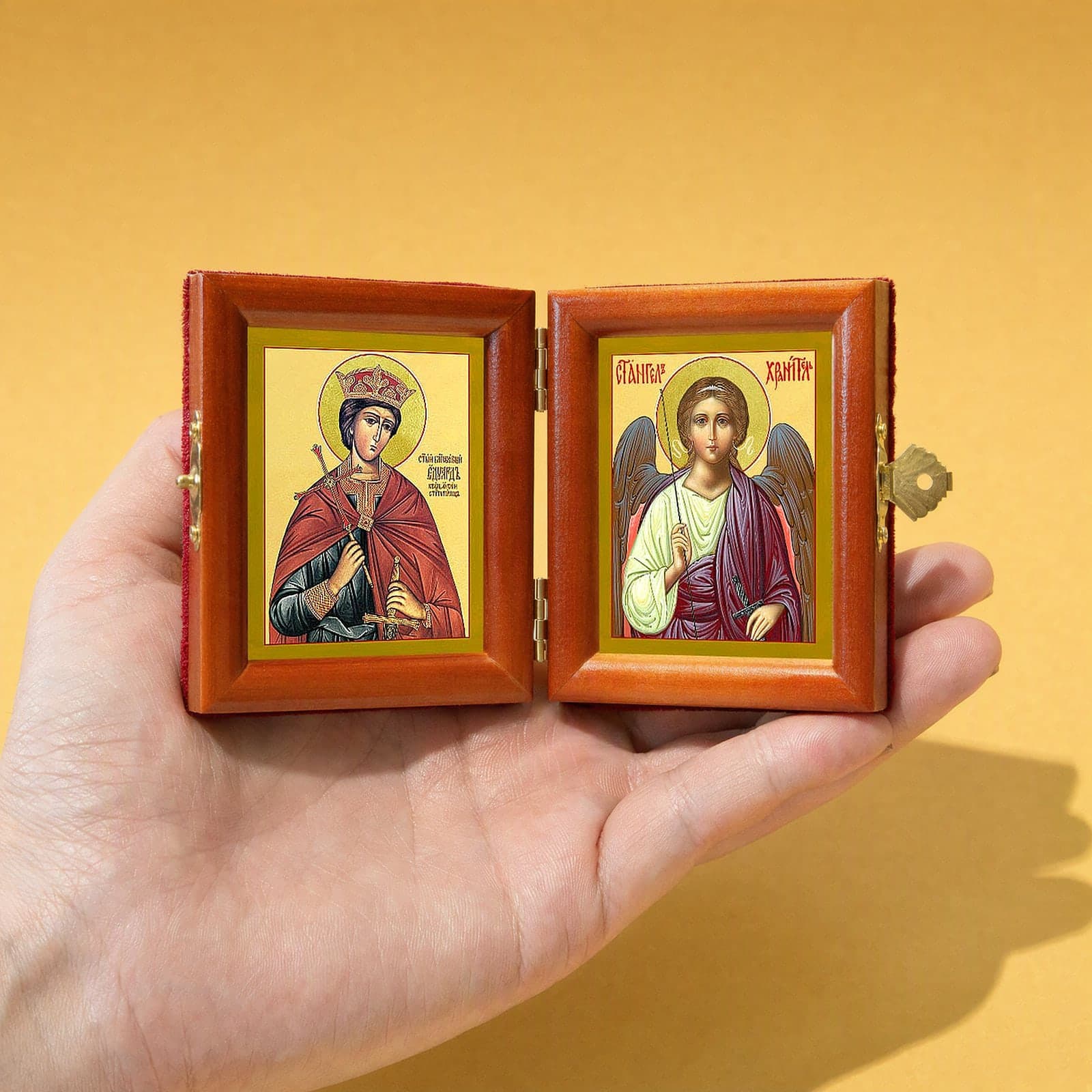 St Edward the Martyr, King of England & Guardian Angel name diptych held open in one hand to show its size: 16.5 cm wide open, about two palm widths.